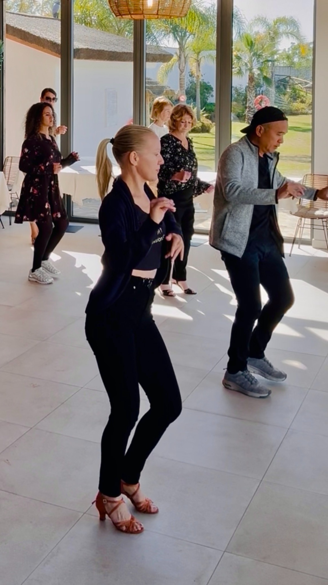 Nina and Louis leading a Bachata class